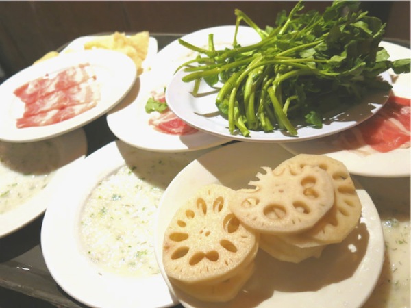 The Magic of ChongQing Hot Pot Watercress Veg, Lotus Roots, Sliced Pork and Fish Paste
