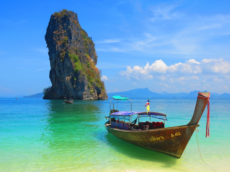 Longtail boat docked on Poda Island Beach in Krabi