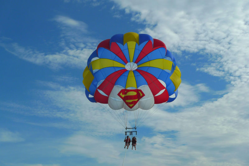 Evan and Raevian parasailing above