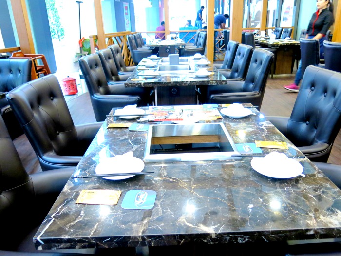 Hai Xian Lao Marble Table and Leather Chairs