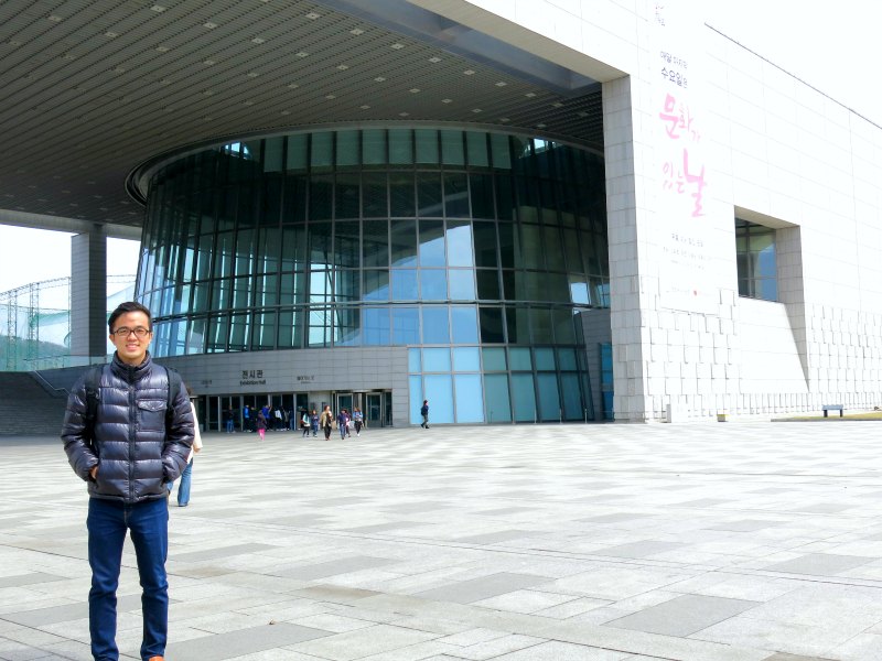 Evan posing in front of the museum